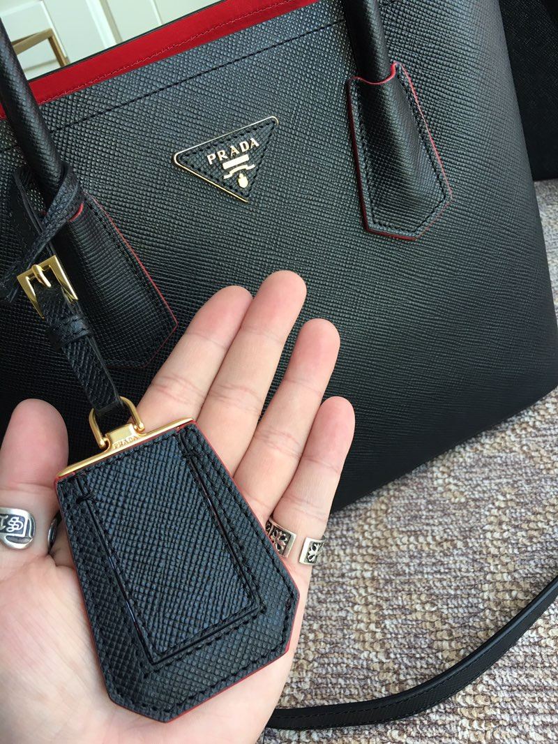 Pra*a top handle bags